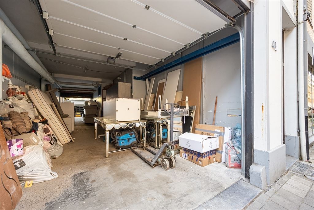 Magazijn pal in de stad met grote woonst - foto 2