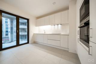 Telephone: 02 318 18 08 - The Scarlet Project is located on the Tour &amp; Taxis site in the Iconic Park Lane project. The project was designed by noA Architects, who worked in collaboration with Sergison Bates and awg on the concept and design of Park Lane. The building has 6 floors and 28 apartments (1-2 &amp; 3 bedrooms), all offering spacious living rooms with high-end finishes, as well as beautiful terraces overlooking the project's gardens or the Tour &amp; Taxis park.<br />The project, equipped with solar panels, triple glazing and a rainwater recovery system, will offer you the best energy performance.<br />An investment guaranteed to be flawless in this neighborhood in full revival!