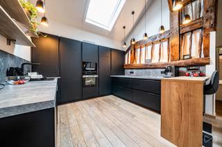 We Invest Malmedy is pleased to present this multi-unit property with endless possibilities, located in the peaceful hamlet of Setz, in Saint-Vith, in the heart of a particularly sought-after green setting.<br /><br />Built on a 2,597 m² lot, this property offers nearly 345 m² of living space and currently consists of a 6-person guesthouse, an apartment, a workshop with storage areas, and an authentic valley house dating back to 1615.<br /><br />Completely renovated in 2022, the property requires no further work and offers numerous advantages: EPC C, up-to-code electrical system, solar panels, sheep’s wool insulation, compliance with fire safety standards, and oil-fired central heating.<br /><br />The vacation rental, available on a short-term basis and boasting excellent reviews, features 3 bedrooms, a spacious living room, a fully equipped kitchen, and a bathroom with a whirlpool tub. The apartment, available starting April 1, 2027, features a bright living room opening onto a fully equipped kitchen, an office, and a master bedroom with an en-suite bathroom and a pellet stove.<br /><br />Each unit has its own southeast-facing terrace, perfect for fully enjoying the peaceful surroundings.<br /><br />Numerous possibilities for additional development remain available thanks to the attics and available land.<br /><br />A rare property, ideal for combining residential living, tourism, or a professional venture in one of the most sought-after regions of eastern Belgium.