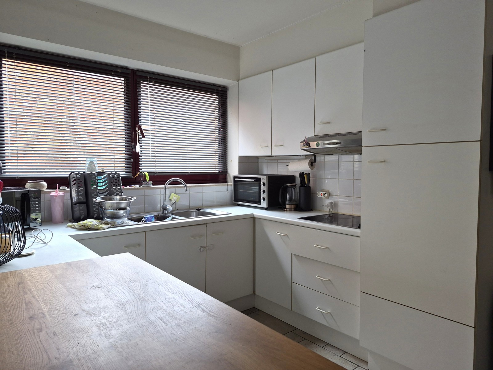 Gelijkvloers appartement met 2 slaapkamers en carport. - foto 5