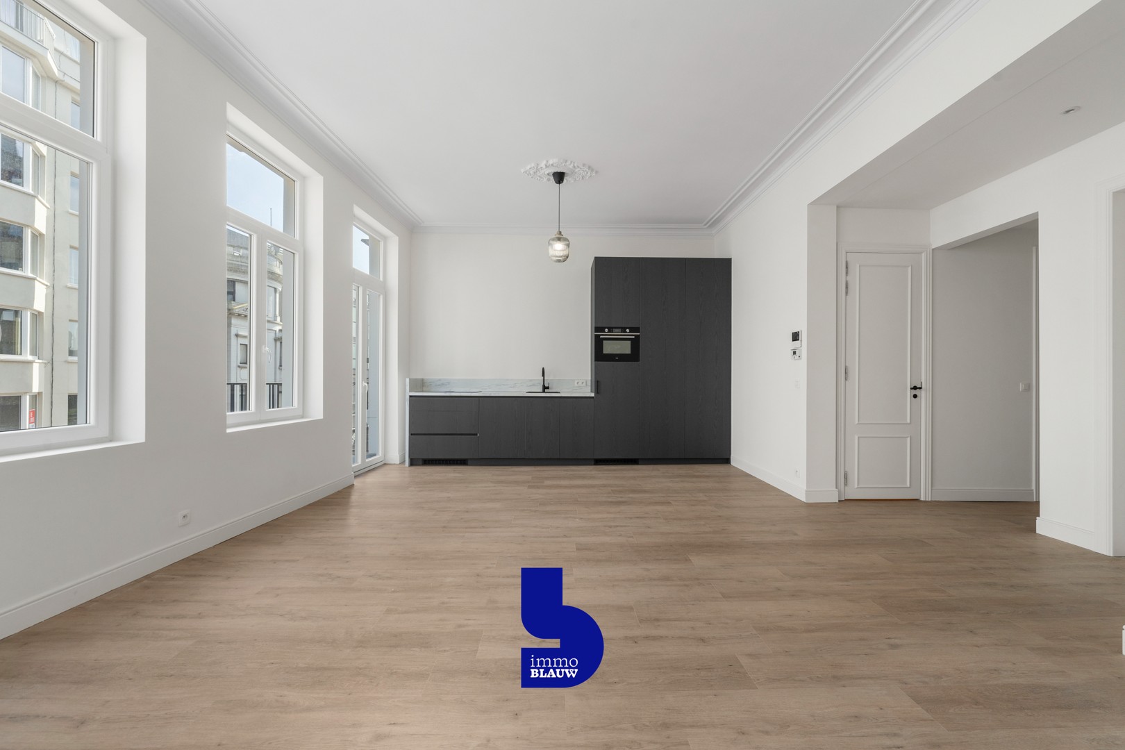 Gerenoveerd appartement in statig herenhuis met charmant terras - foto 5