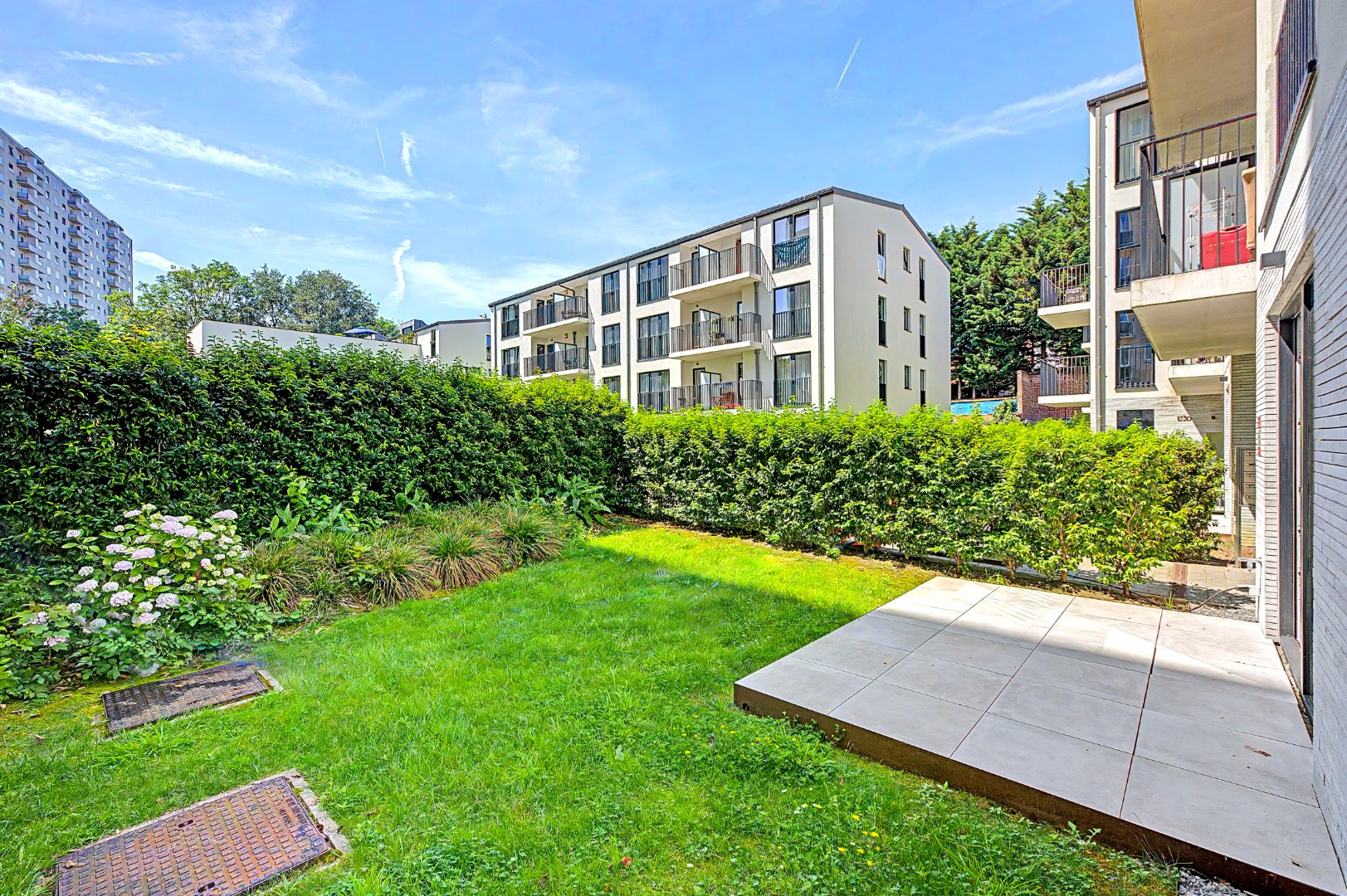 Nieuwbouwappartement met tuin en terras - foto 4
