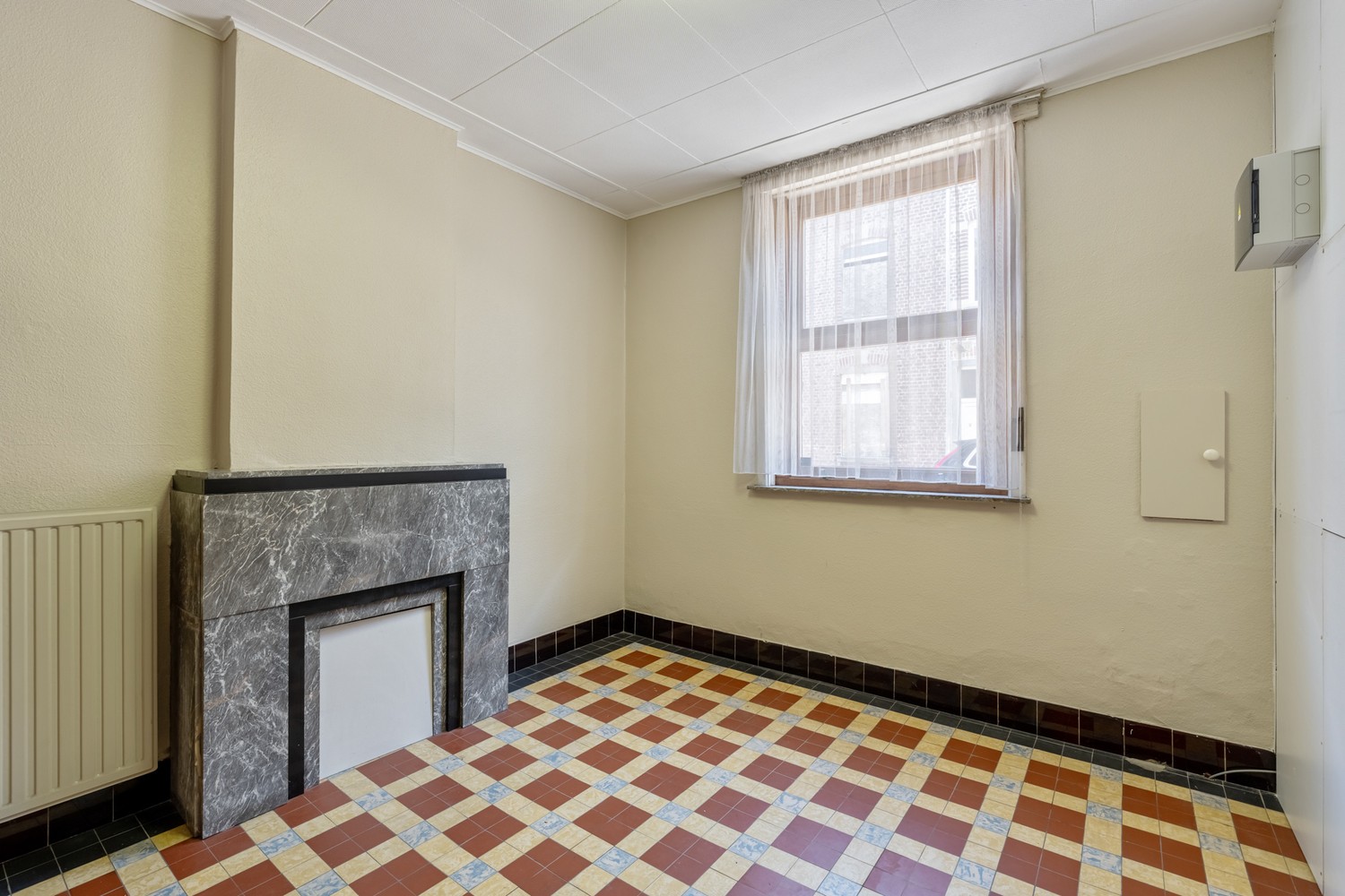 Karaktervolle stadswoning met 3 slaapkamers en zuidwestgerichte tuin in hartje Leuven. Een unieke kans! - foto 4