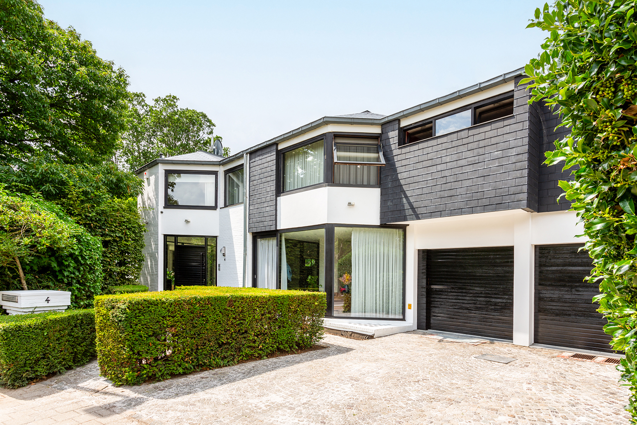Topgelegen architectenwoning met ruim tuin en binnenzwembad. - foto 3