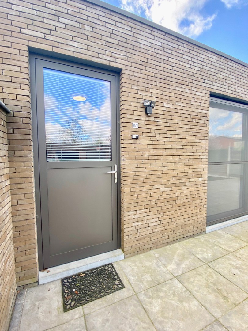 Tijdloos GELIJKVLOERS appartement met 2 slaapkamers te Oosteeklo ! - foto 4