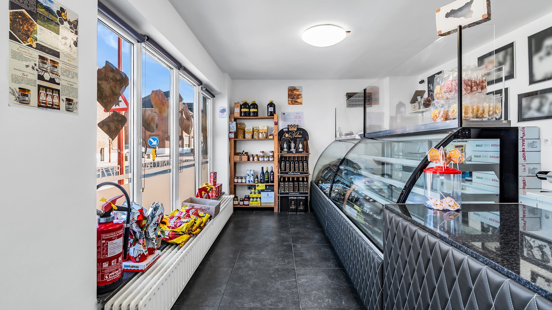 Wonen boven je zaak? Ontdek deze instapklare opportuniteit in het hart van Maasmechelen - foto 3