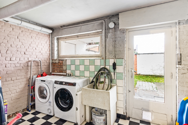 Centraal gelegen rijwoning met 2 SLK, garage en stadstuin - foto 5