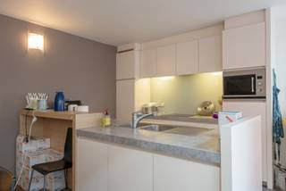 (Investerings)appartement van ca. 105 m² met 2 slaapkamers in Residentie "Nationale Bank" aan de Turnhoutse Grote Markt. Zeer gunstige EPC-score:...