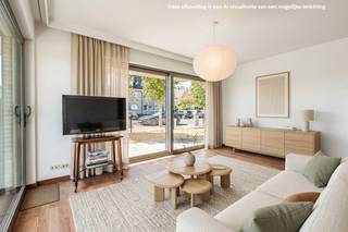 <strong>De Panne: appartement te koop op unieke locatie aan de Houtsaegerduinen</strong><br /><br />Op zoek naar een instapklaar appartement op een uitzonderlijke locatie aan de Belgische kust? Dit gelijkvloersappartement in residentie Rhapsody geniet van een unieke ligging, met de prachtige Houtsaegerduinen als directe buren. Bovendien bevindt het zich op wandelafstand van het centrum van De Panne. Dankzij de ligging aan de duinen is het appartement volledig omringd door terrassen, waardoor u vanuit verschillende ruimtes optimaal kunt genieten van het **open zicht op de duinen**.<br /><br />Het appartement is modern, verzorgd en volledig instapklaar. Daarnaast bestaat de mogelijkheid om een garage met extra berging aan te kopen tegen een meerprijs.<br /><br /><strong>Indeling</strong><br /><br />Inkomhal, apart toilet, lichtrijke woonkamer met prachtig zicht op de Houtsaegerduinen, meerdere terrassen rondom het appartement, praktische berging met alle nodige aansluitingen, slaapkamer met aansluitend een badkamer met douche<br /><br /><strong>Troeven</strong>
<ul><li>Unieke ligging: rechtstreeks grenzend aan de Houtsaegerduinen</li><li>Terrassen: optimaal genieten van de uitzonderlijke ligging</li><li>Garage &amp; berging: mogelijkheid tot aankoop van een garage met extra berging tegen meerprijs</li><li> Op wandelafstand van het strand en het centrum</li></ul>
<br />Een uitzonderlijke kans voor wie op zoek is naar een comfortabel appartement met rust, natuur en een unieke ligging aan zee.<br />