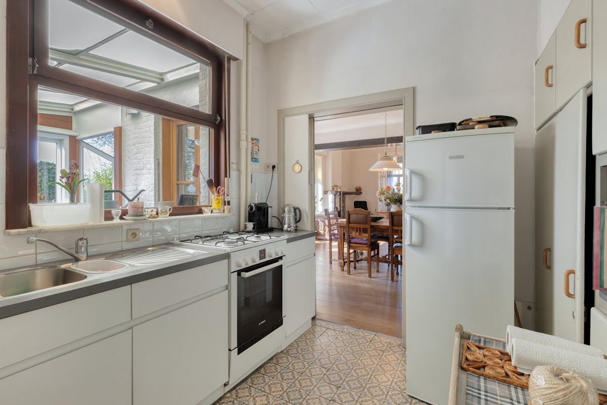 Karaktervolle woning met ruime tuin gelegen langs het water. - foto 5