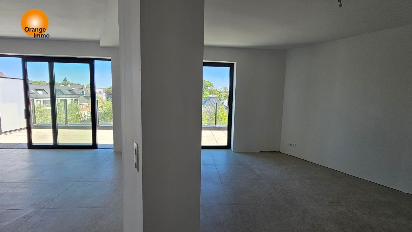 Nieuwbouwappartement met één slaapkamer gelegen in het commercieel en bruisend centrum van Eisden. Een appartement voor wie wil wonen in een gezellig en comfortabel complex voorzien van tal van faciliteiten. - foto 5