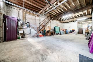 OPTION....OPTION....OPTION....Situé dans une rue calme de Tirlemont, à proximité immédiate du centre-ville et des axes autoroutiers, cet entrepôt...