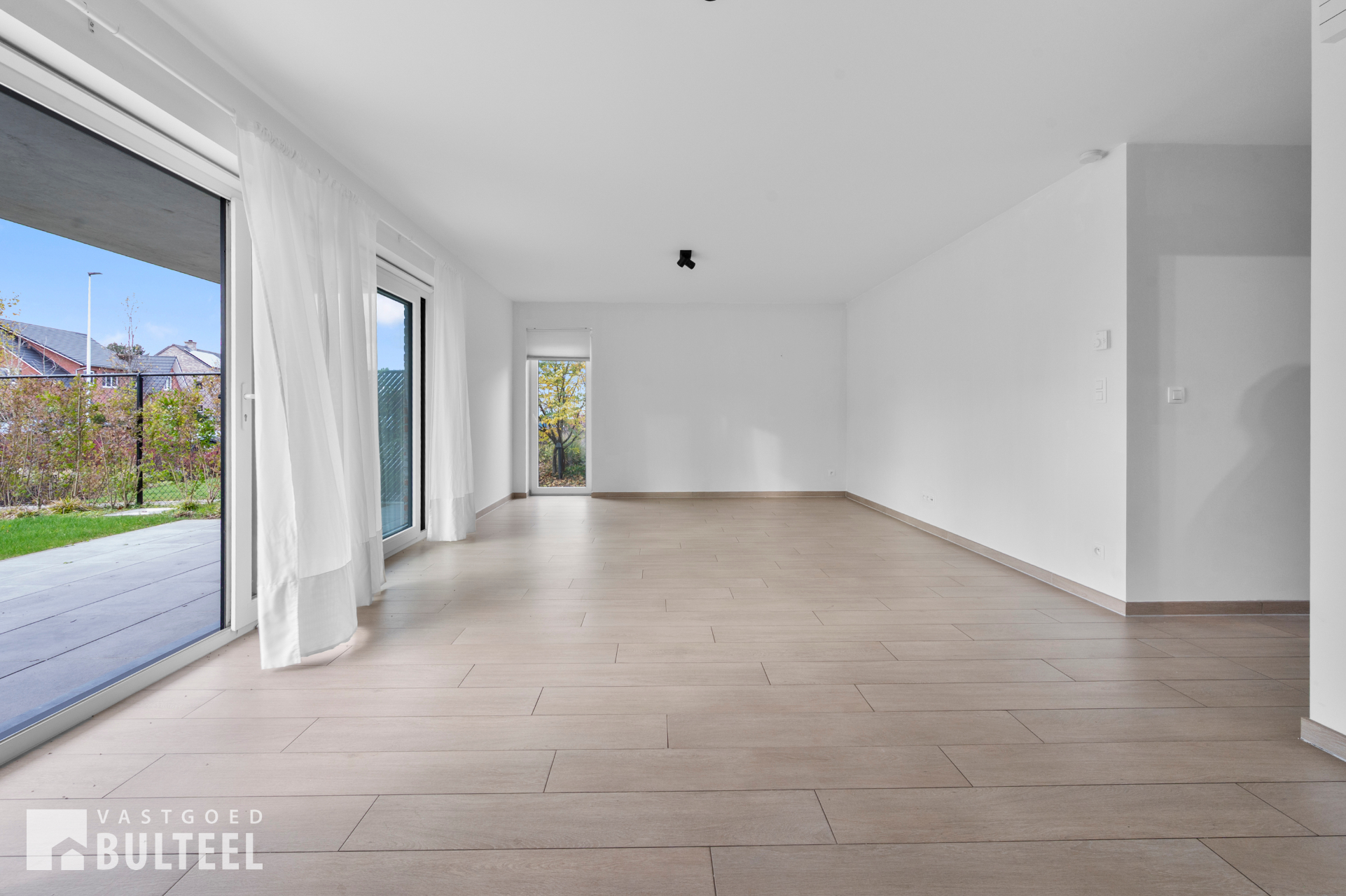 Energiezuinig gelijkvloers appartement met 2 slpkrs, garage en tuin! - foto 5