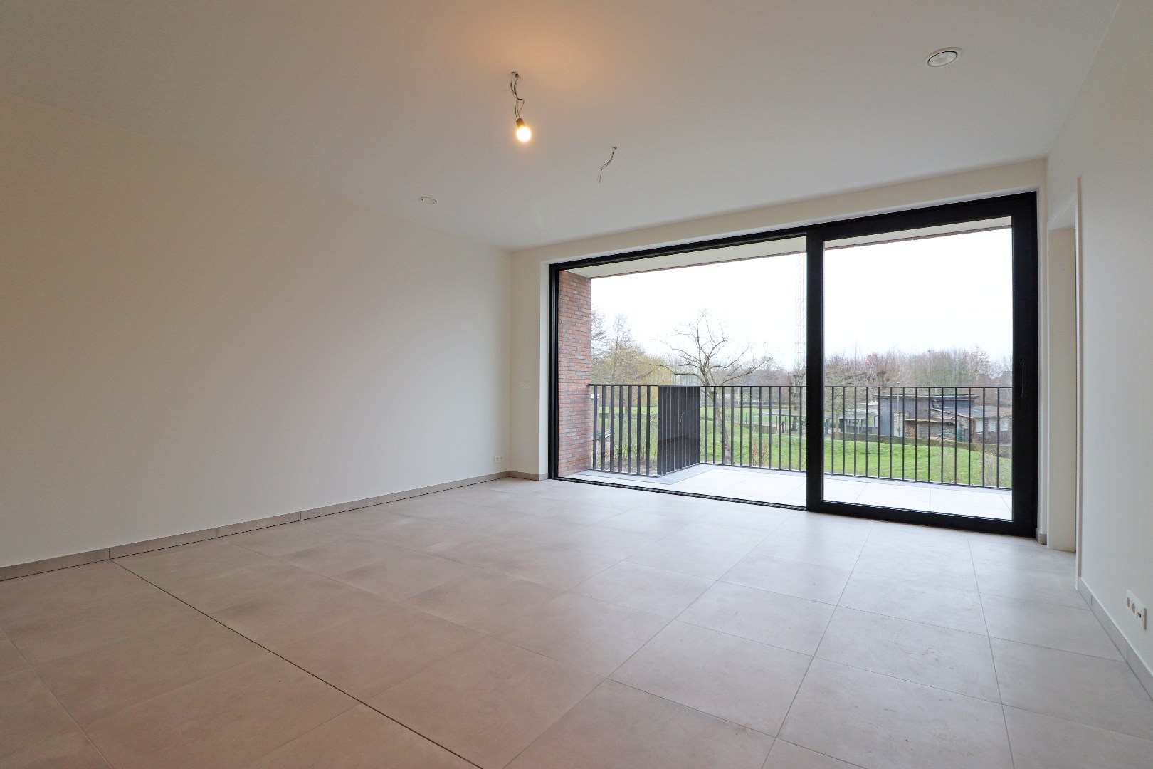 Nieuwbouwappartement met parkeerplaats - foto 2