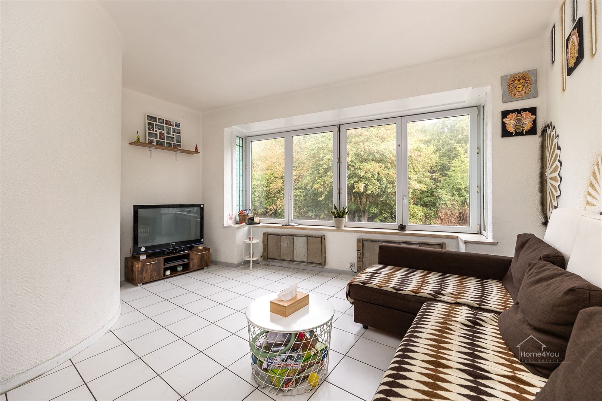 Lichtrijk 2-slaapkamerappartement met terras - foto 4
