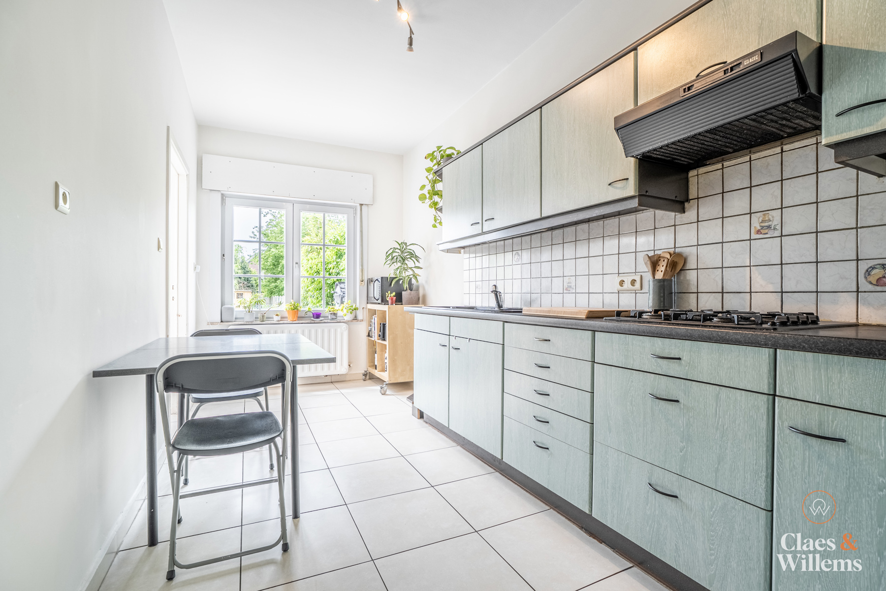 Instapklare woning met 3 slaapkamers, garage en ruime tuin - foto 4