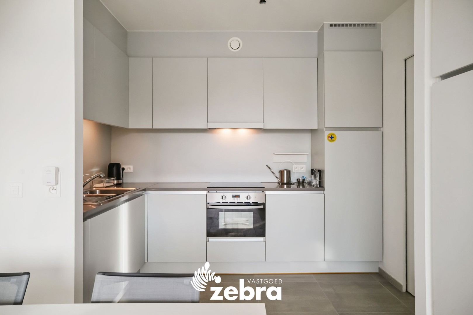 Moderne serviceflat met prachtig zicht op de Leie en autostaanplaats te Deinze! - foto 5