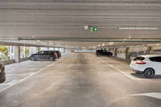 9 spacious covered parking spaces for rent in the new parking tower at Westwing Park The ideal location for companies active in the Westwing Tower or other Westwing Park towers. - The price for 1 parking space is 70 euro/month- The parking spaces are located side by side- They can be rented together or separately- Automatic opening of the barrier via license plate recognition- Name plates can be placed at any parking space- The connection to install any charging stations has already been providedAre you looking for parking spaces to rent at Westwing Park? Contact us for more information.