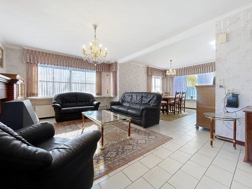 Karaktervolle alleenstaande woning met garage én tuin - foto 3