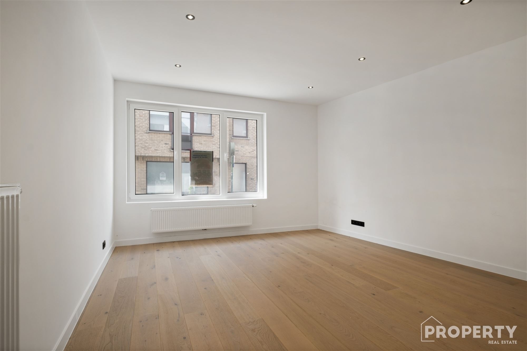 Energiezuinig gelijkvloers-appartement met garage - foto 4