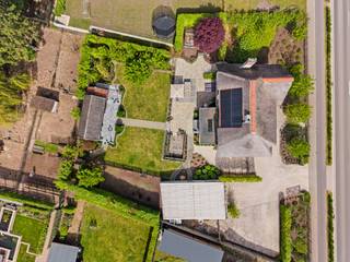 Deze prachtige landelijke villa, gelegen op een perceel van maar liefst 1.424 m², bevindt zich op een uitstekende locatie in Lummen...