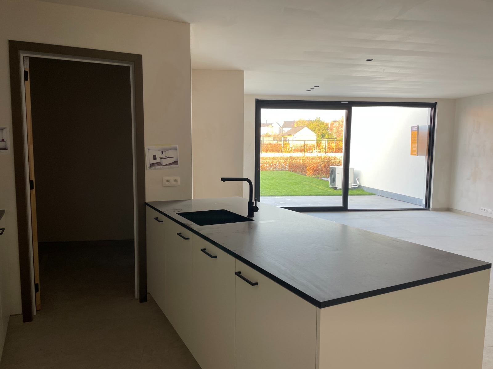 Net opgeleverd ruim nieuwbouwappartement met 2 slaapkamers en tuin in het centrum van Bornem. - photo 4