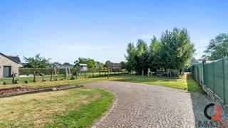 Nabij het centrum van Paal gelegen vrijstaande eengezinswoning met tal van mogelijkheden op een perceel van maar liefst 14A 37CA.Gelijkvloers+...