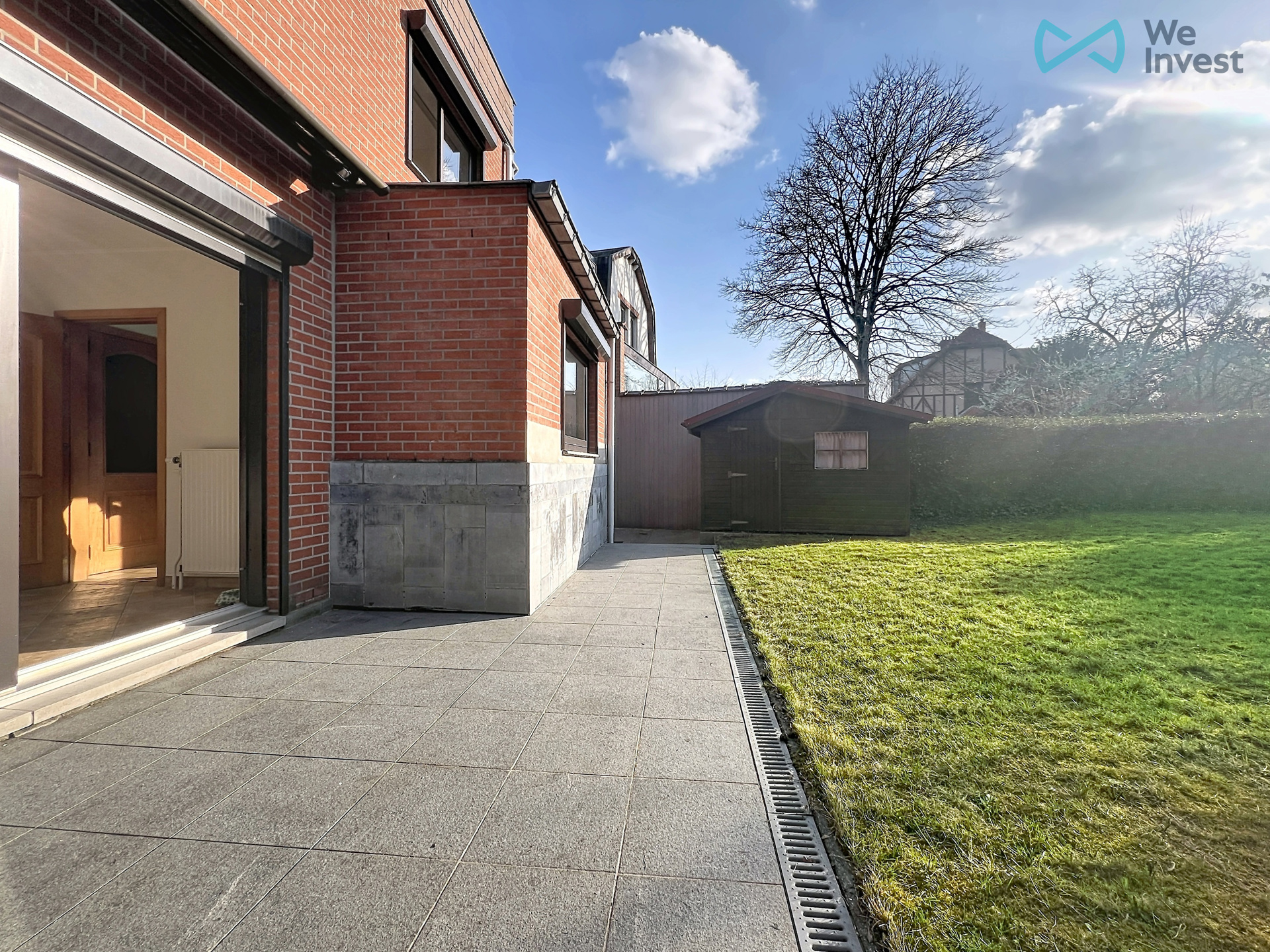 Tweegezinswoning met verhuurd appart, dubbele garage en tuin - foto 3