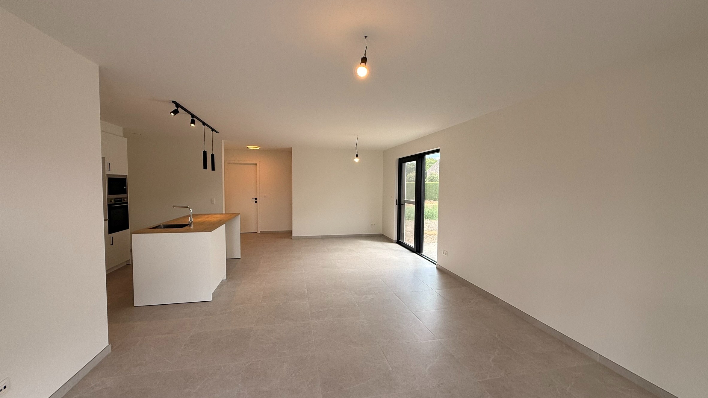 Gelijkvloers nieuwbouwappartement met tuin in Bree - foto 5