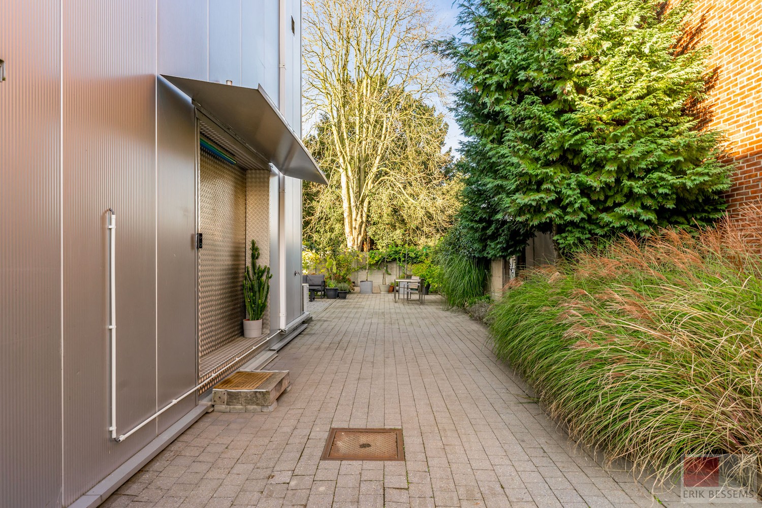 Architectenwoning met stalen constructie en glazen achtergevel - photo 5