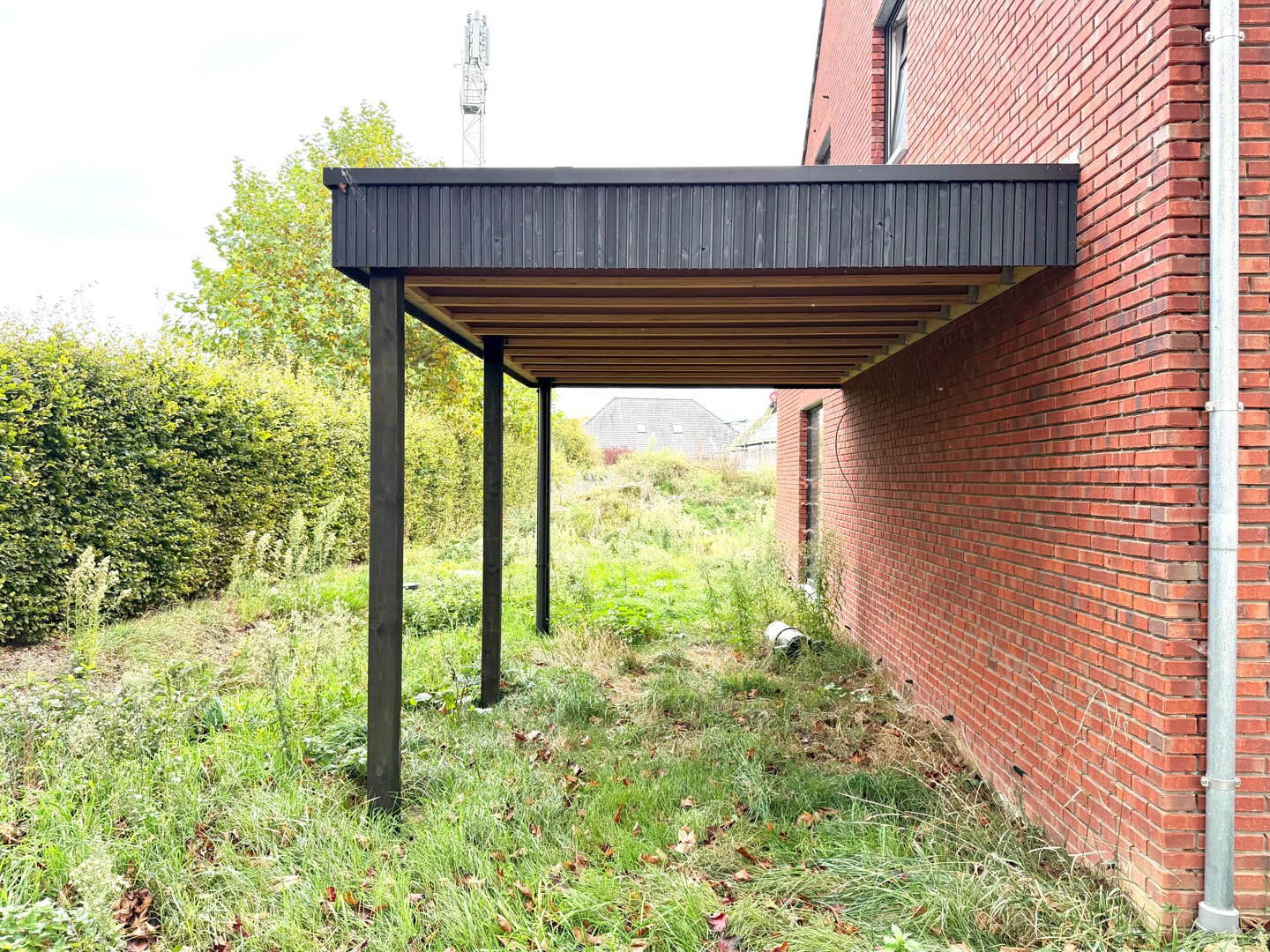 Moderne halfopen nieuwbouwwoning met ruime tuin en carport op 419 m² - foto 4