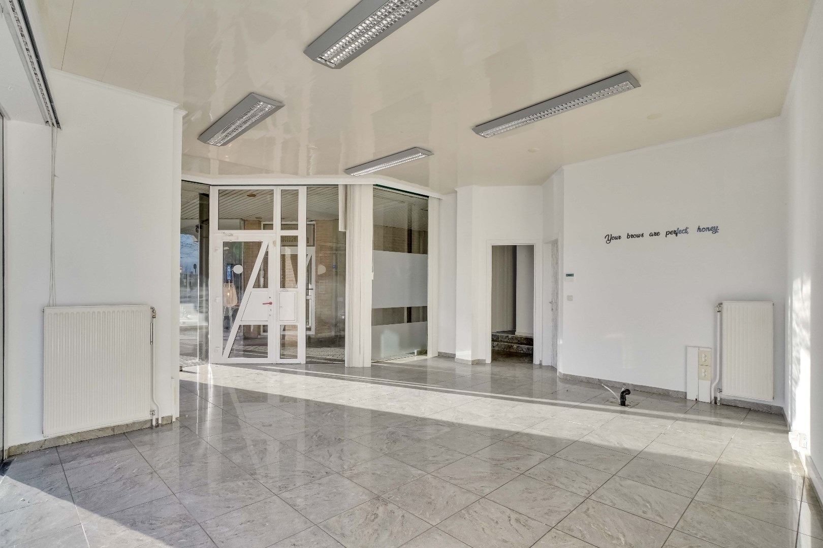 RUIM HANDELSPAND OP EEN ZICHTLOCATIE IN HET CENTRUM VAN LANAKEN ! - foto 5