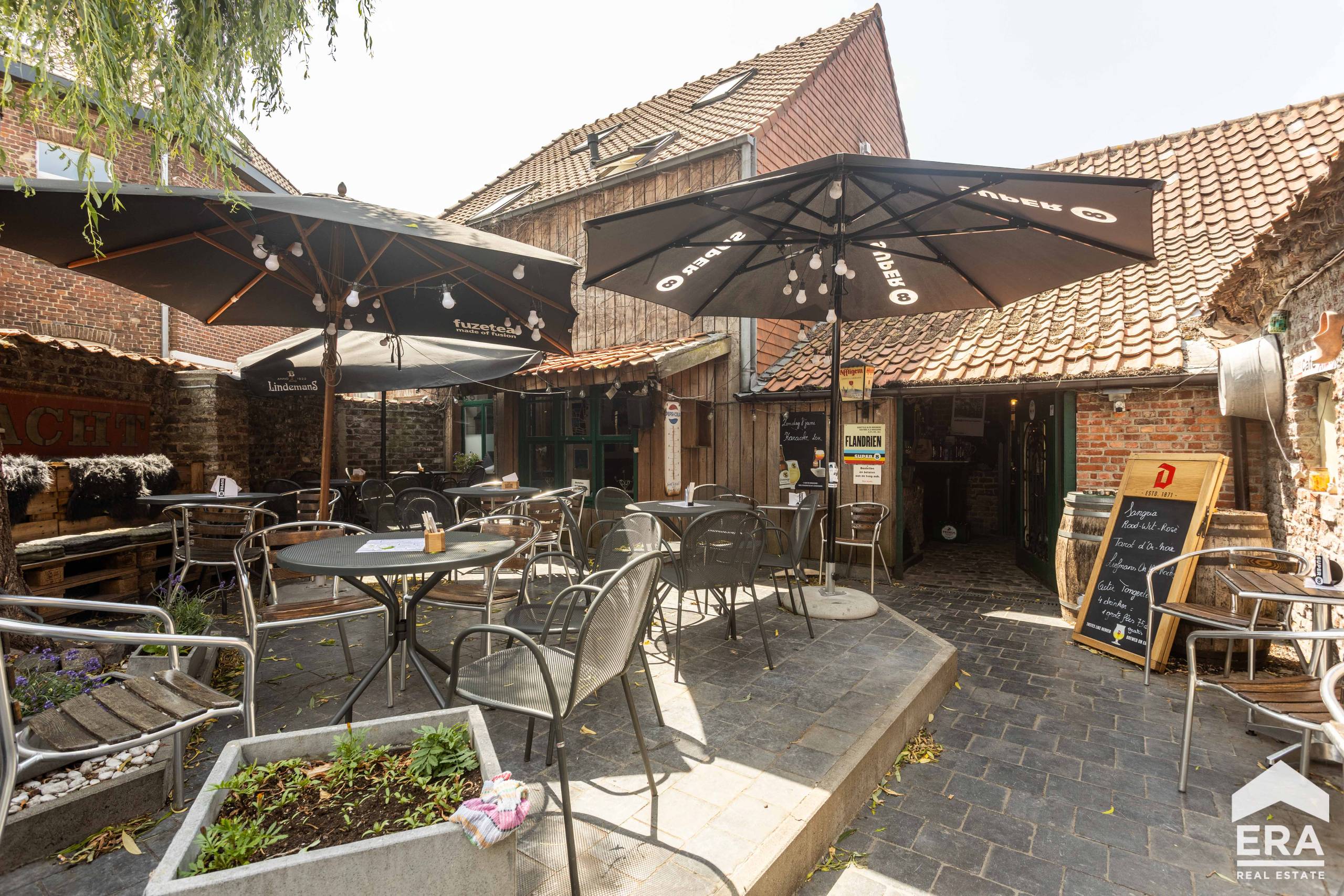 Opbrengsteigendom met handelszaak & studio’s (7% rendement) - foto 1