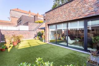 Gelegen in de gegeerde Harmoniewijk, combineert deze unieke stadswoning van ca 148 m² (cfr. EPC) absolute rust met een centrale ligging...