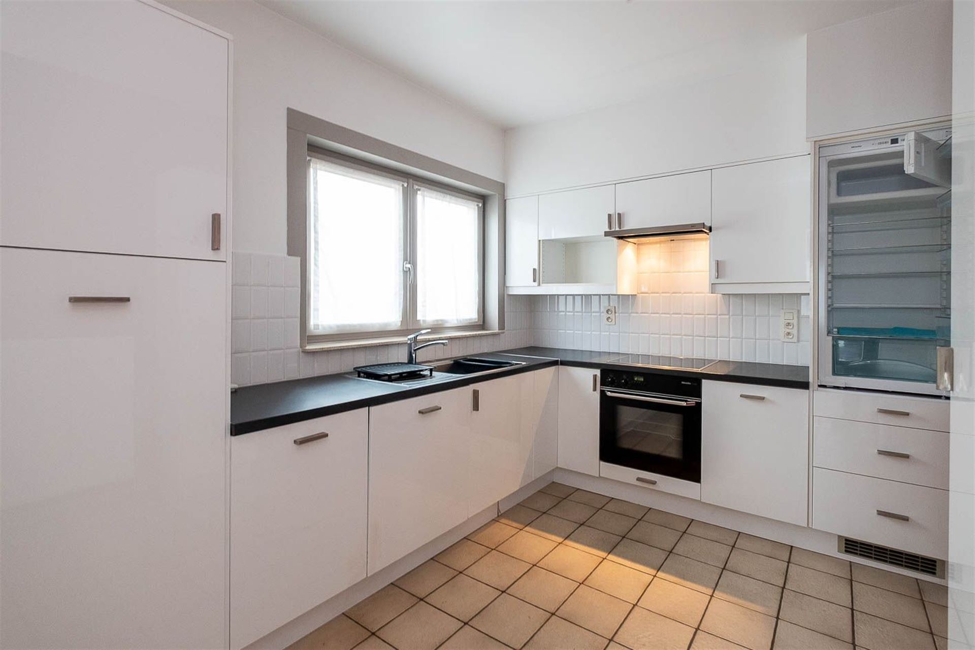 Appartement met 2 slaapkamers, inpandige garage met oprit en privé tuin 95m² - foto 5