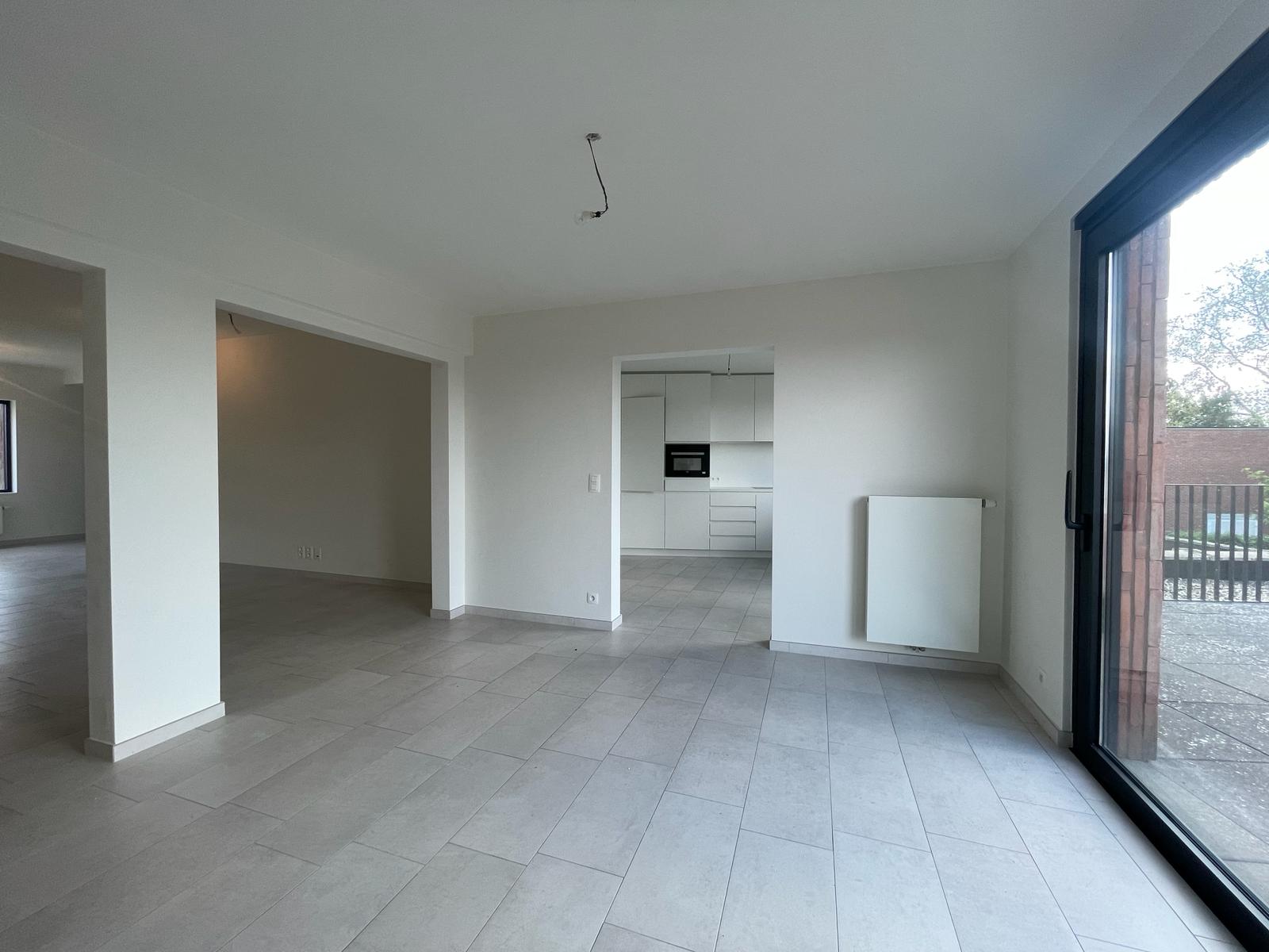 Duplex app met 3 slpks en tuin - foto 5