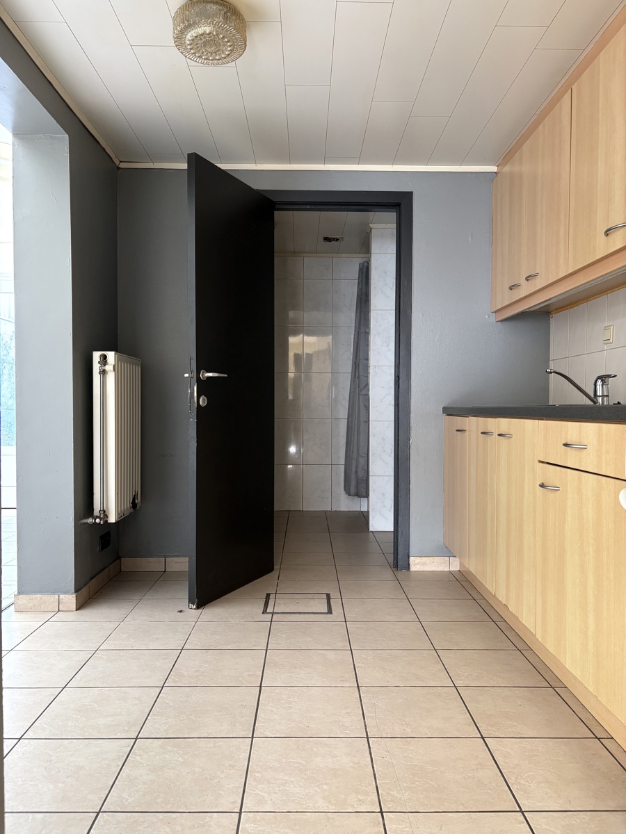 Rustig én centraal gelegen, te renoveren woning met tuin - foto 4