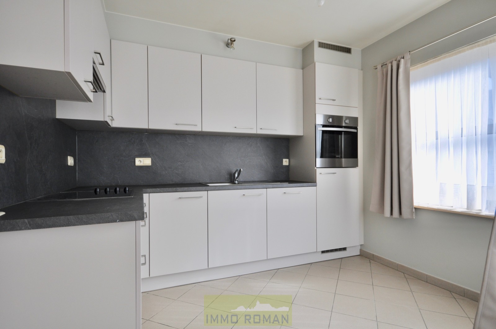 Instapklaar gelijkvloers appartement met tuin te Ruien - foto 5
