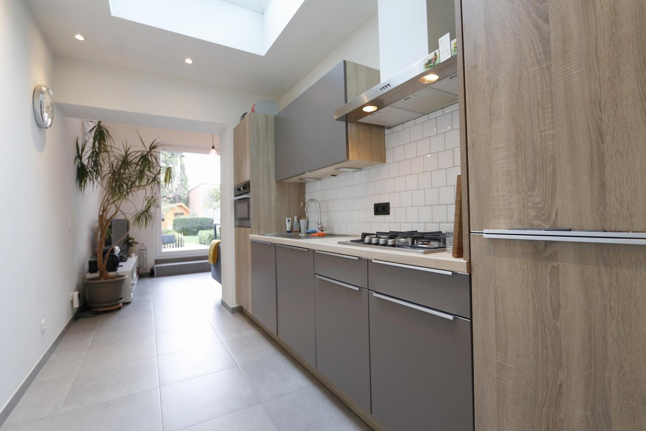 Gezellige woning met 3 slaapkamers en charmante tuin te Beveren! - foto 5