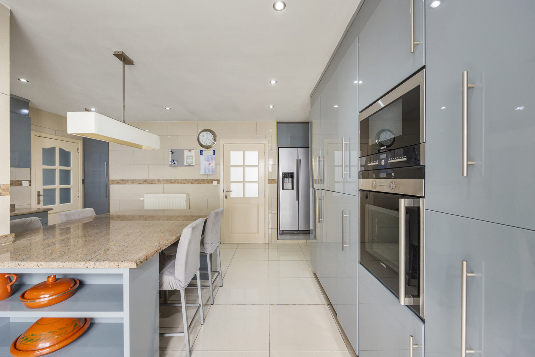 Ruime gezinswoning met 4 slaapkamers, 2 badkamers en garage - foto 5