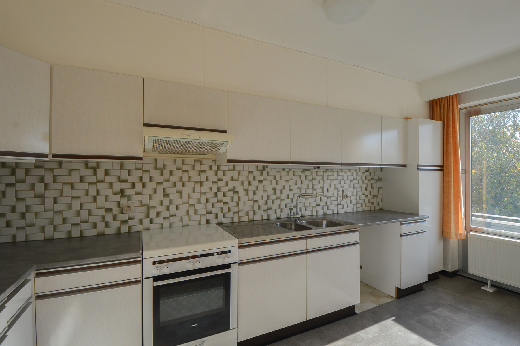 APPARTEMENT MET 2 SLAAPKAMERS EN GARAGE, MET ZICHT OP PARK - foto 5