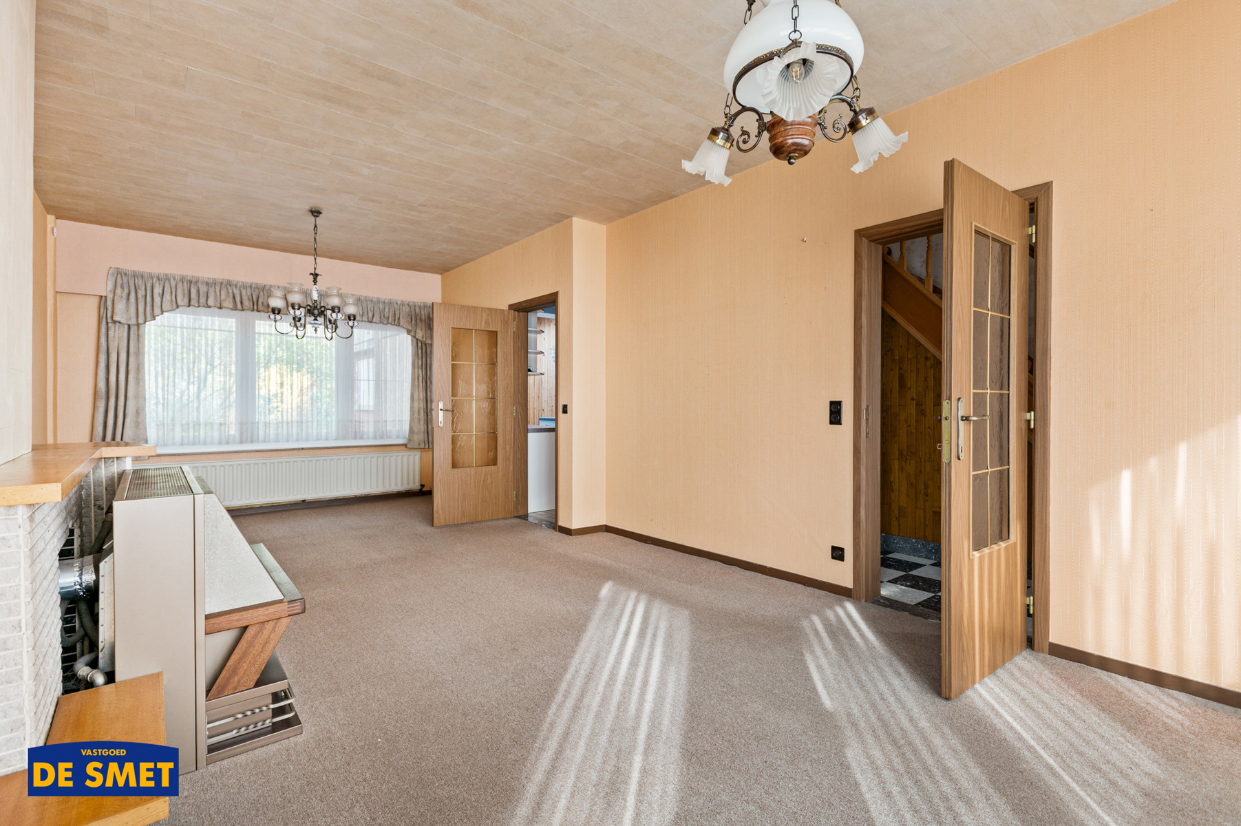 Te renoveren halfopen bebouwing met oprit, garage en tuin - foto 2