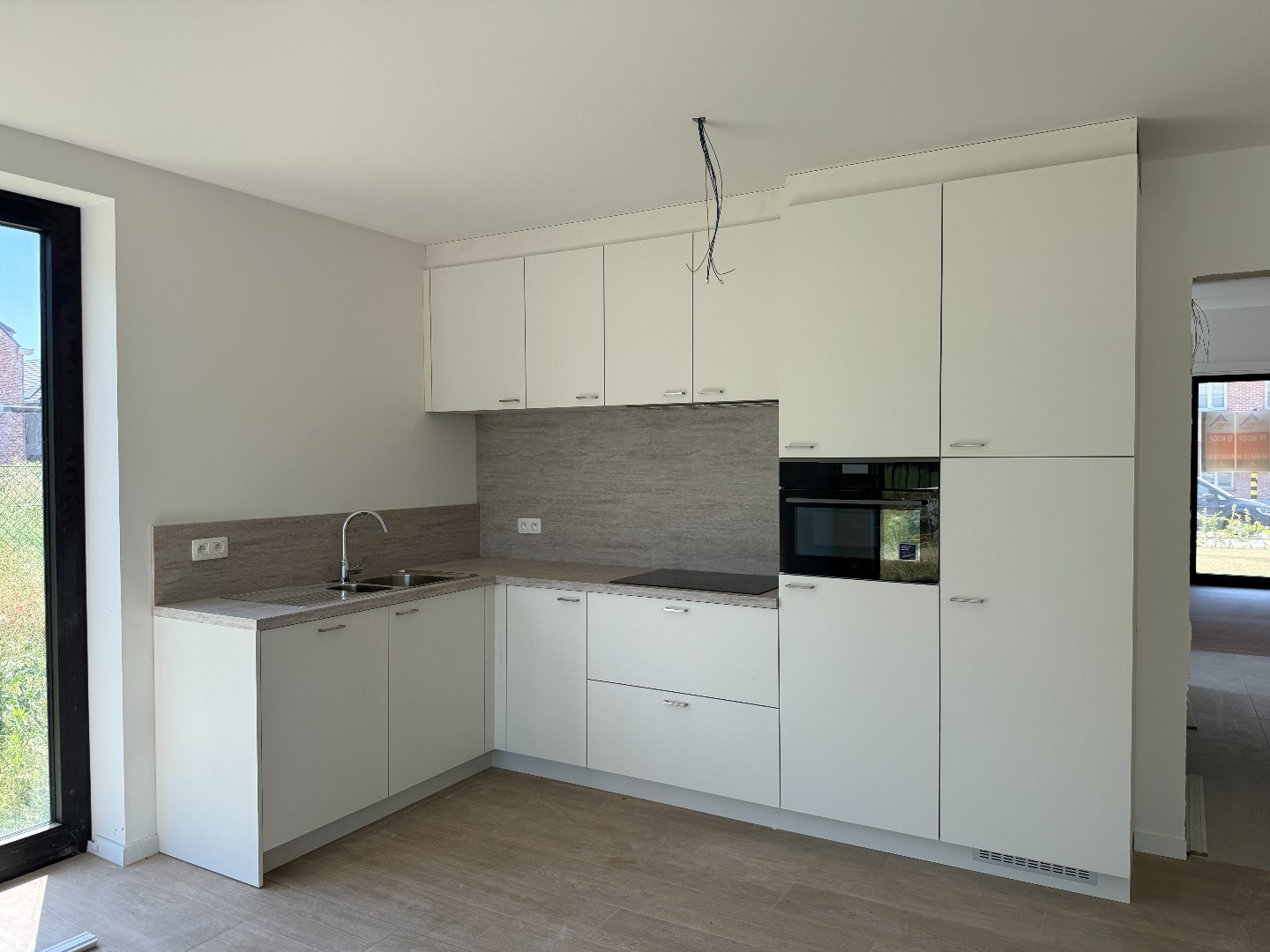 Laatste gelijkvloers 2-slpk appartement met tuin, 1 stpls en een kelder - foto 5
