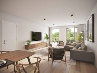 Dit modern gelijkvloers appartement in Zwijnaarde voldoet aan alle standaarden van comfort en luxe. Gelegen op een ideale locatie, biedt dit appartement een prachtig uitzicht vanaf het ruime terras. 
Het appartement werd gebouwd in 2025 waardoor het voldoet aan de nieuwste bouwnormen en -eisen. Het is voorzien van moderne voorzieningen en heeft een energielabel A, wat betekent dat het energiezuinig is en lagere energiekosten met zich meebrengt.
Het gebouw is uitgerust met een lift, waardoor het appartement gemakkelijk toegankelijk is. Het beschikt ook over twee badkamers, wat zorgt voor extra comfort en functionaliteit.
De ligging van dit appartement is een van de grootste troeven. Het is gelegen nabij het Parkbos en het Technologiepark en dicht bij alle voorzieningen zoals winkels, restaurants en openbaar vervoer. Bovendien is het slechts een korte afstand verwijderd van het bruisende stadscentrum van Gent.
Kortom, dit appartement biedt een perfecte combinatie van comfort, locatie en moderne voorzieningen. Met zijn ruime terras, lift, drie slaapkamers en twee badkamers, is het ideaal voor gezinnen of mensen die op zoek zijn naar een ruim en luxueus appartement in het Gentse.
Fraai aangelegde, gemeenschappelijke tuin met vijver.
Mogelijkheid tot aankoop van een ondergrondse staanplaats.
Perfect voor eigen bewoning of als vastgoedinvestering voor de verhuur!!
Mogelijkheid aankopen aan 6% BTW