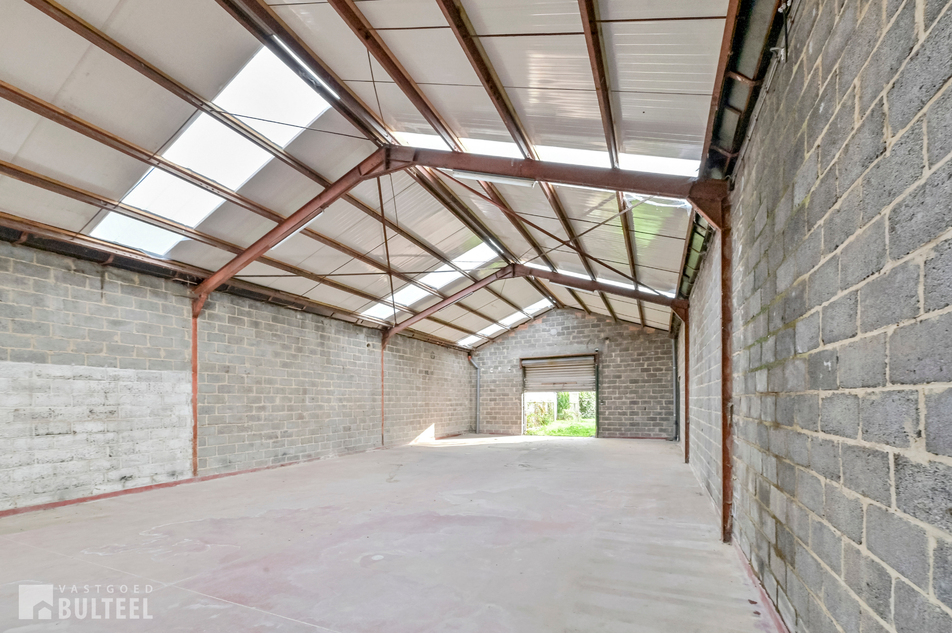 Veelzijdige eigendom met appartement, garage en magazijn! - foto 4