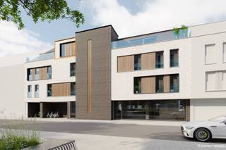 Dit instapklare nieuwbouwappartement op de derde verdieping van Brugstraat 67/3.01 in Heusden-Zolder combineert moderne architectuur met energiezuinig wonen. Met een bruto bewoonbare oppervlakte van 108,18 m² en een royaal terras van 25,89 m² biedt deze woning een ruimtelijk gevoel en optimaal comfort. De afwerking is van hoge kwaliteit en voldoet aan de hedendaagse normen op het gebied van duurzaamheid en energie-efficiëntie.<br /><br />Het appartement maakt deel uit van een kleinschalig en stijlvol nieuwbouwproject met slechts acht appartementen en één handelspand. De architectuur is strak en modern, met oog voor lichtinval en een slimme indeling. Een lift brengt je moeiteloos naar de derde verdieping, waar slechts twee exclusieve penthouses zijn ondergebracht.<br /><br />De leefruimte en keuken beslaan samen 42,48 m² en zijn ontworpen met openheid en functionaliteit in gedachten. Grote raampartijen zorgen voor een natuurlijke lichtinval en een directe verbinding met het terras. De keuken is volledig te personaliseren, zodat deze perfect aansluit bij jouw smaak en levensstijl.<br /><br />Dit appartement beschikt over twee slaapkamers van respectievelijk 13,67 m² en 10,19 m². Beide kamers bieden voldoende ruimte voor een comfortabel bed en opbergruimte. De hoofdslaapkamer grenst aan de badkamer, wat zorgt voor extra gebruiksgemak.<br /><br />De badkamer is modern ingericht en uitgerust met een inloopdouche, een stijlvolle wastafel en kwalitatieve materialen. Een apart toilet en een handige berging van 6,74 m² maken het geheel compleet.<br /><br />Het terras is een absolute troef en biedt met zijn noordwestelijke en zuidwestelijke oriëntatie de ideale plek om in de namiddag- en avondzon te genieten van een rustige buitenomgeving. Dankzij de ruime opzet kan je hier zowel een eethoek als een loungegedeelte creëren.<br /><br />Dit energiezuinige project heeft een E-peil van 30, dat verlaagd kan worden naar E20 bij installatie van zonnepanelen. Vloerverwarming in het hele appartement zorgt voor een aangename en efficiënte warmteverdeling.<br /><br />Een bovengrondse parkeerplaats en een kelderberging zijn optioneel bij aan te kopen. Daarnaast is er een gemeenschappelijke fietsenstalling voorzien voor extra gemak.<br /><br />De ligging is uitstekend: winkels, horeca en supermarkten bevinden zich op wandelafstand, terwijl het openbaar vervoer praktisch voor de deur stopt. Met scholen op slechts 353 meter en de snelweg op 1,83 km ben je verzekerd van een vlotte verbinding.<br /><br />Belangrijk om te weten is bovendien dat de grondwaarde hier vastgelegd werd op 75.000€. Op deze som betaal je dus slechts 12% registratierechten. Op de constructiewaarde van 274.842€ is er 21% btw verschuldigd (BTW-tarief van 6% (onder voorwaarden)). Dit instapklare penthouse biedt een unieke kans om te wonen in een stijlvol en duurzaam nieuwbouwproject. Interesse? Neem contact op voor een persoonlijke rondleiding en ontdek zelf de troeven van dit appartement. Voor meer informatie, bel 011 255 155.