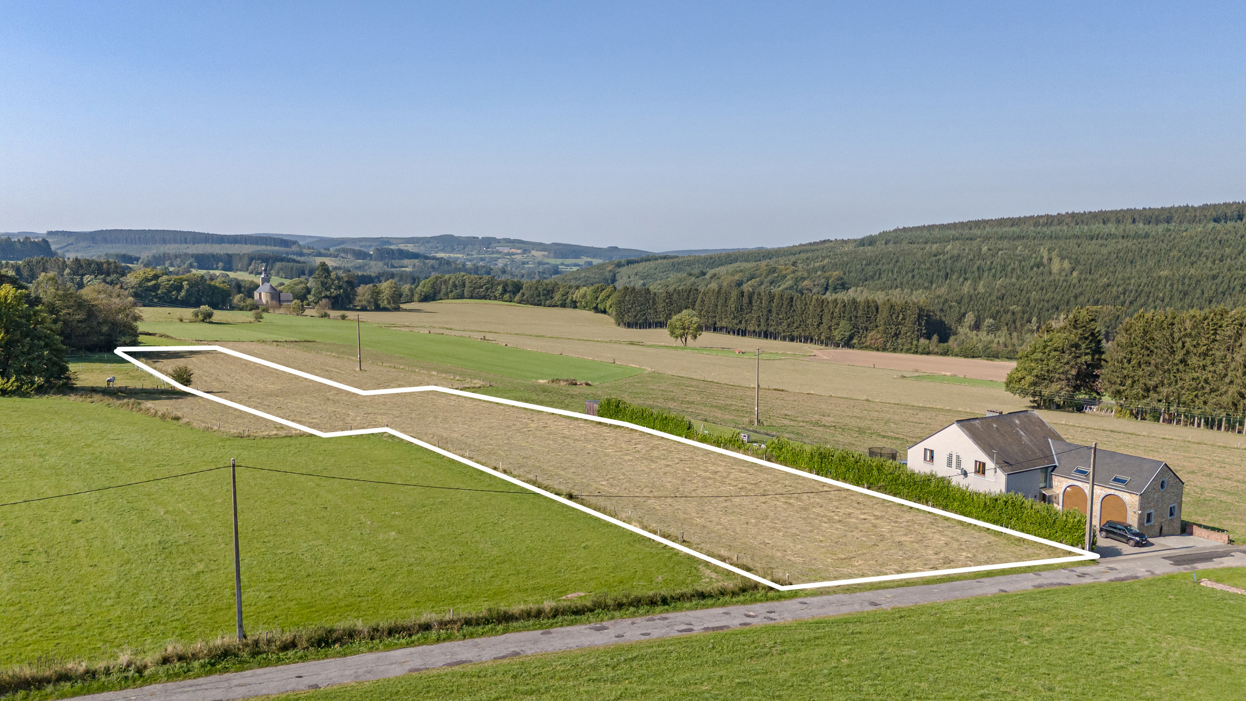 Bouwgrond open bebouwing op perceel van 5.751m² te Manhay. - foto 3