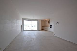Statiestraat 41A / 1.2 - 8980 PassendaleStijlvol en comfortabel wonen in een recent gebouwd appartement met een moderne afwerking..Via de verzorgde...