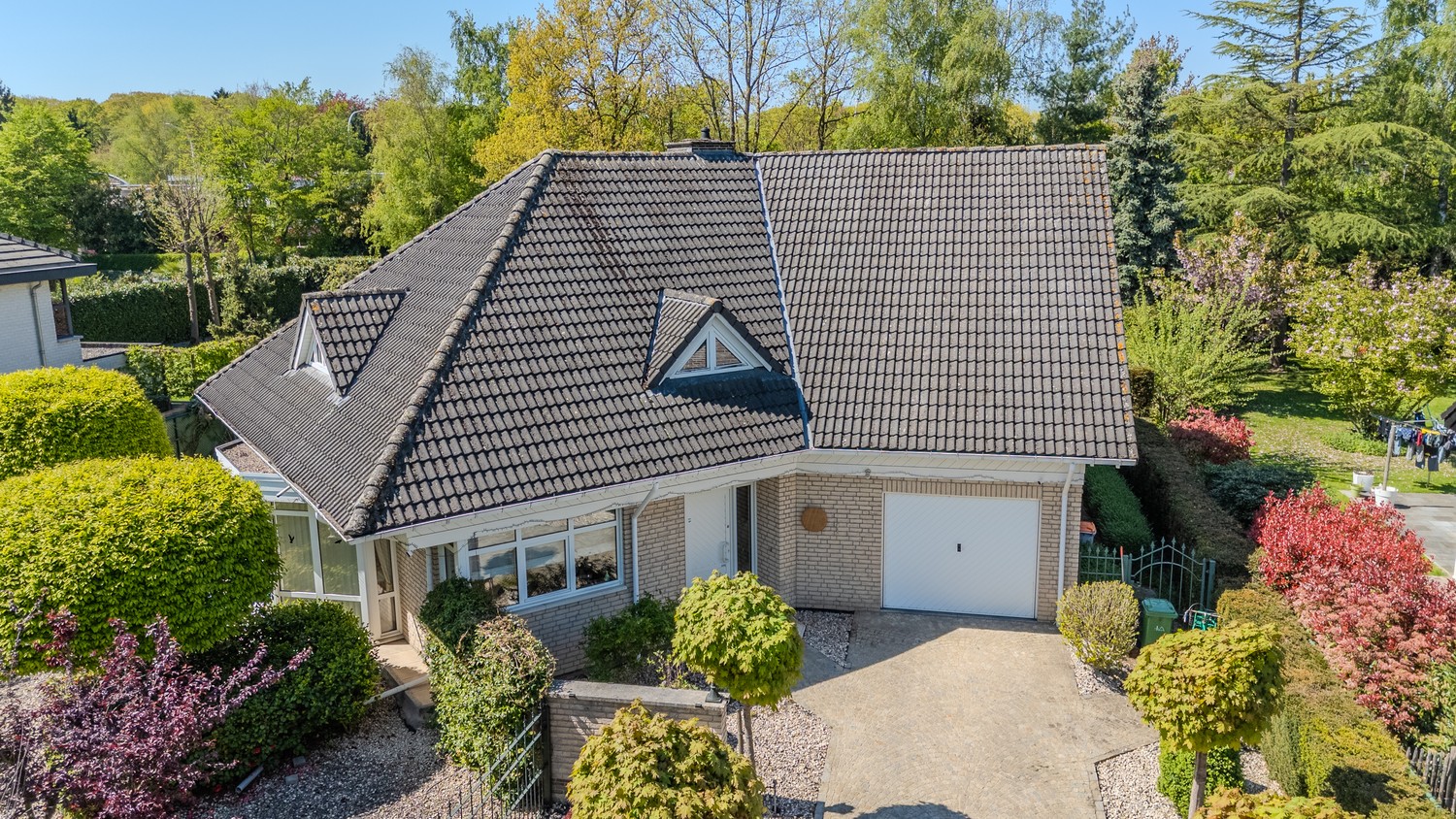 Ruime, instapklare vrijstaande woning met 5 slaapkamers en 3 badkamers in het gezellige Neerharen! - foto 5