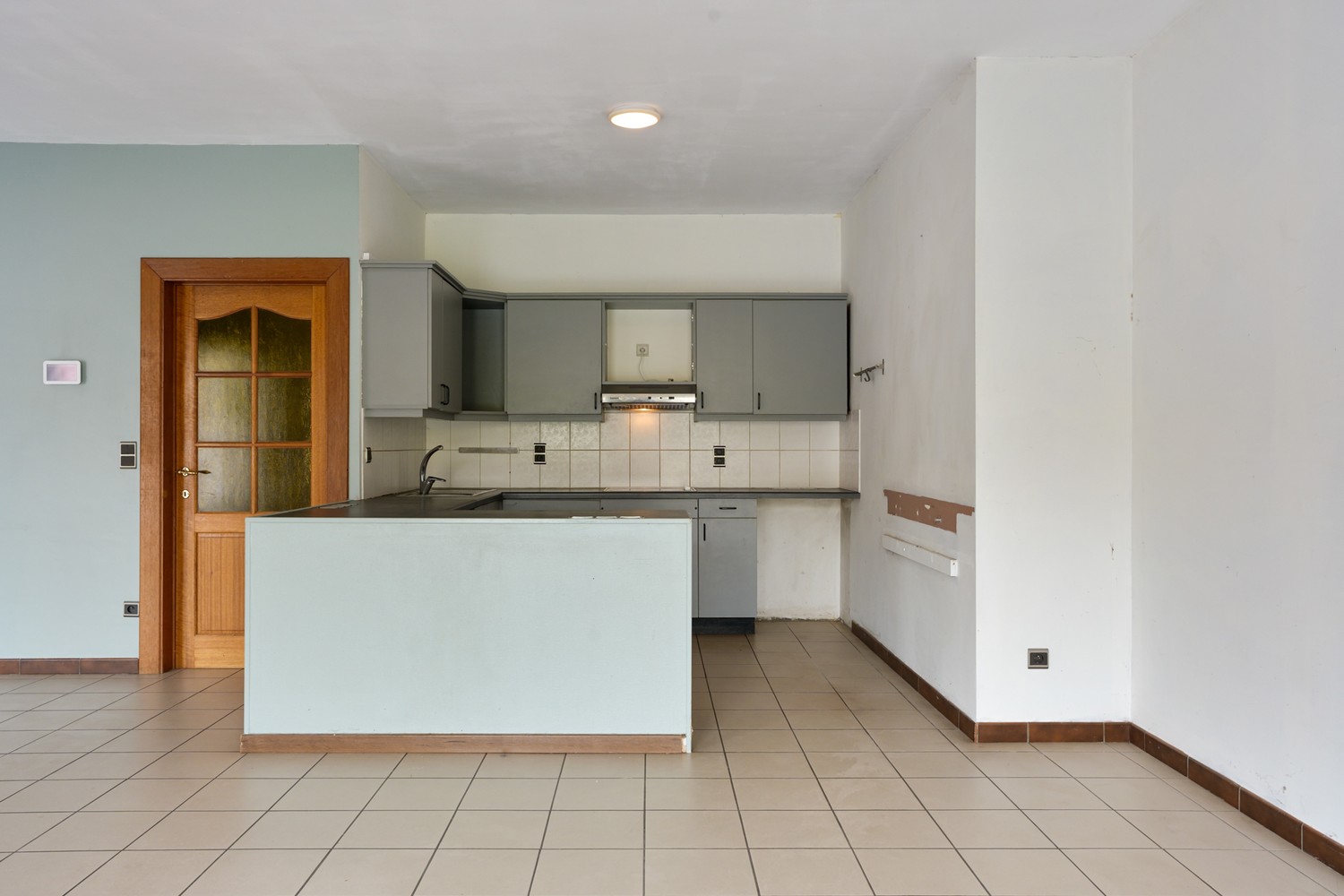 Gelijkvloers appartement met 2 slaapkamers, een ruim terras, 2 autostaanplaatsen, een kelder en een tuin grenzend aan de Vijvers van Bellefroid te Leuven! - foto 5